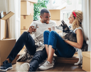 Young couple unpacking their apartment